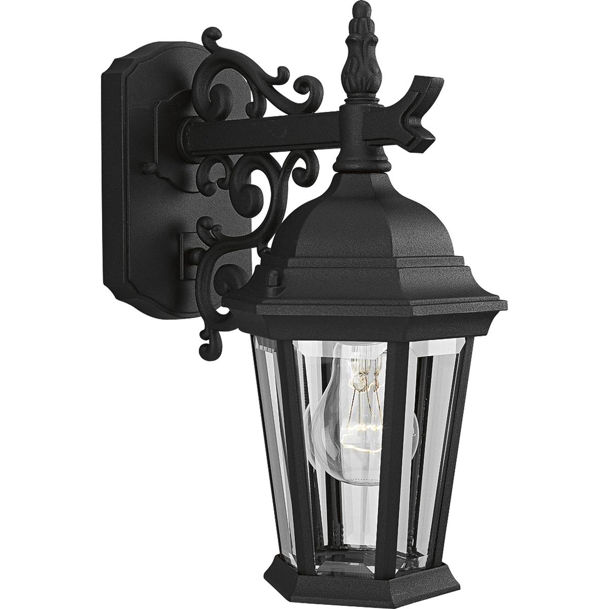 Hubbell P5682-31 The Welbourne collection features hexagonal framework with vine inspired scrolls and clear beveled glass panels. Cast aluminum construction with durable powder coat finish. One-light 6-1/2"  top mount outdoor wall lantern.  ; Hexagonal framework. ; Vine i