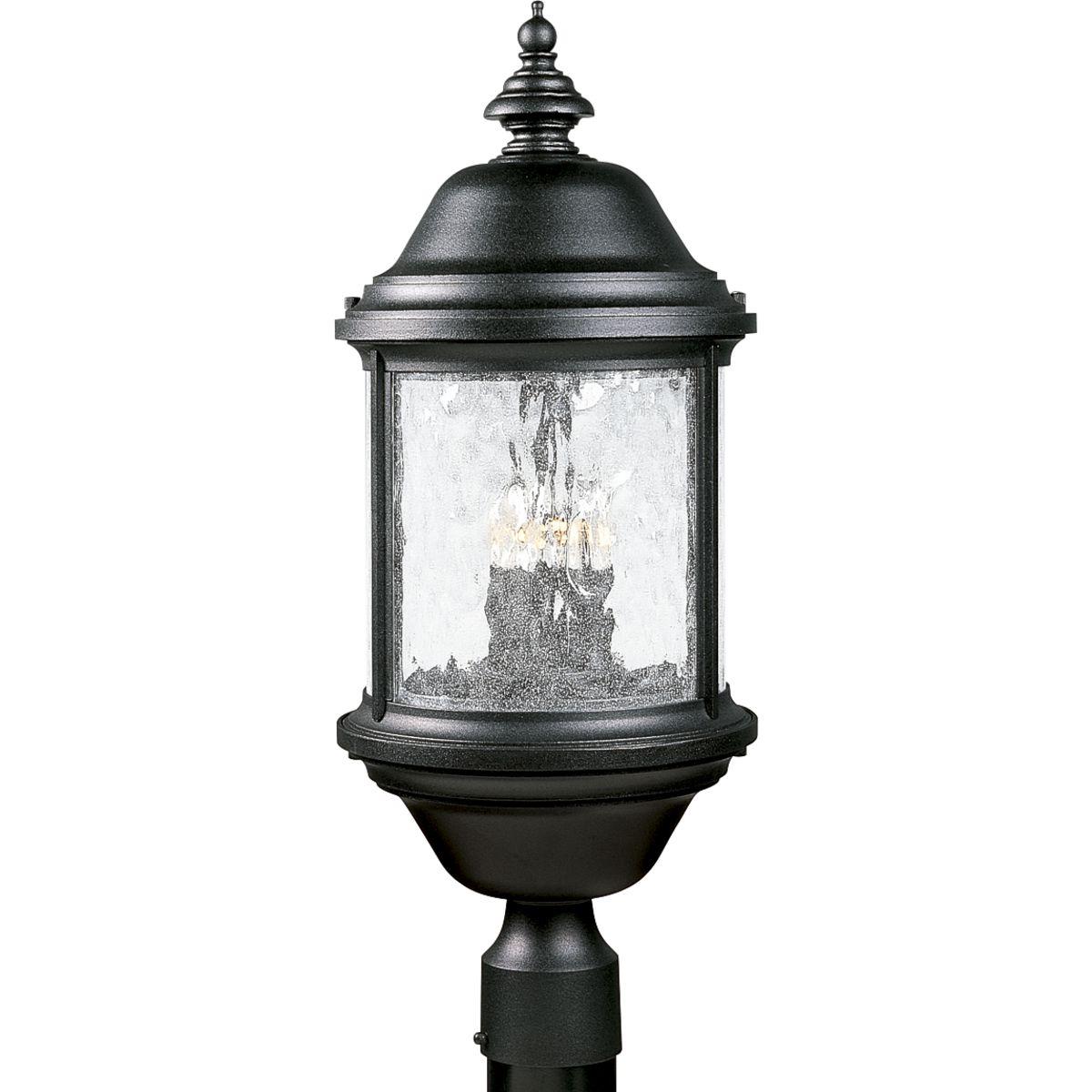 Hubbell P5450-31 Inspired by lanterns from the Old World, the Ashmore collection incorporates handsome details, quill-scrolled arms and decorative finials. The water seeded glass is in a die-cast aluminum frame. The three-light post lantern. Textured Black finish.  ; Text