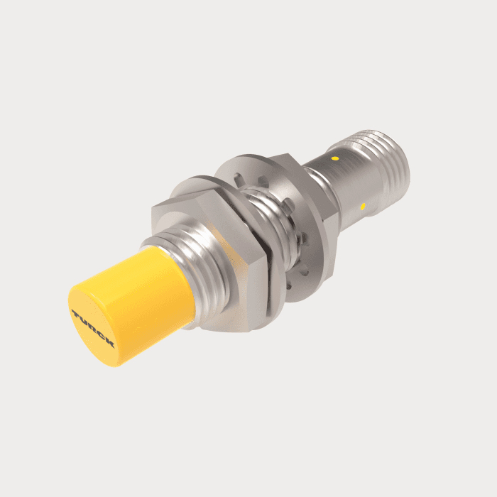 Turck NI4-M12-AN7X-H1141 Turck NI4-M12-AN7X-H1141 is an inductive proximity sensor designed for detecting the presence of metal objects without contact. It operates within an ambient air temperature range of -25°C to +70°C and is equipped with a 4-pin M12 Eurofast QD male connector for easy installation. This sensor is part of the NI...-M12 series and offers a protection degree of IP67, making it suitable for use in environments where dust and water resistance are necessary. It requires a supply voltage of 10-30Vdc, with 12Vdc and 24Vdc as nominal values. The sensor features a partially threaded M12 barrel shape, constructed from chrome-plated brass for durability. It has a sensing distance of 4mm and operates in a normally open (NO) mode. The sensor supports a maximum switching frequency of 2kHz and includes one digital output (10-30Vdc; NPN; TTL-compatible; 150mA max.), allowing for direct interfacing with various digital control systems.