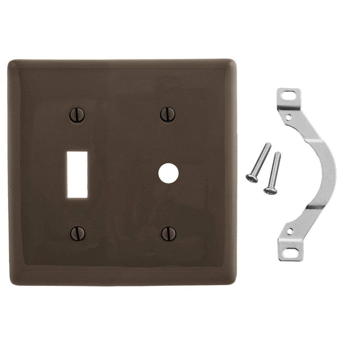 Hubbell NP112 Wallplates, Nylon, 2-Gang, 1) Toggle, 1) .406" Opening, Brown  ; Reinforcement ribs for extra strength ; High-impact, self-extinguishing nylon material ; Captive screw feature holds mounting screw in place ; Standard Size is 1/8" larger to give you extra 