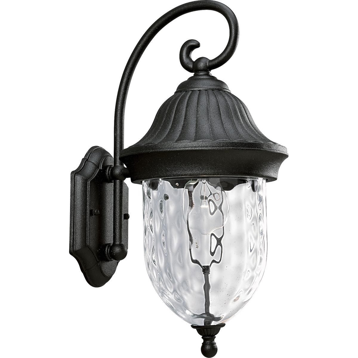 Hubbell P5828-31 Capture the romance with this one-light wall lantern from the Coventry collection that features optic hammered glass, stylized cap and Sheppard's hook. Die-cast aluminum construction. Textured Black finish.  ; Textured Black finish. ; Optic hammered glass
