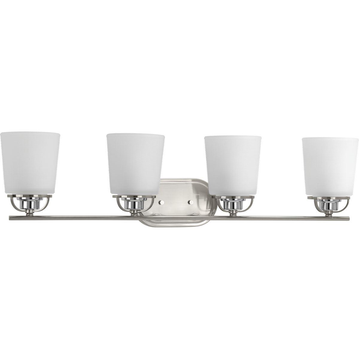Hubbell P300007-009 A modern form with industrial-inspired accents are featured in West Village. Double prismatic glass shades provide a beautiful illumination effect. Visual interest continues with a three-spoke design that holds each glass shade. Brushed Nickel with chrome