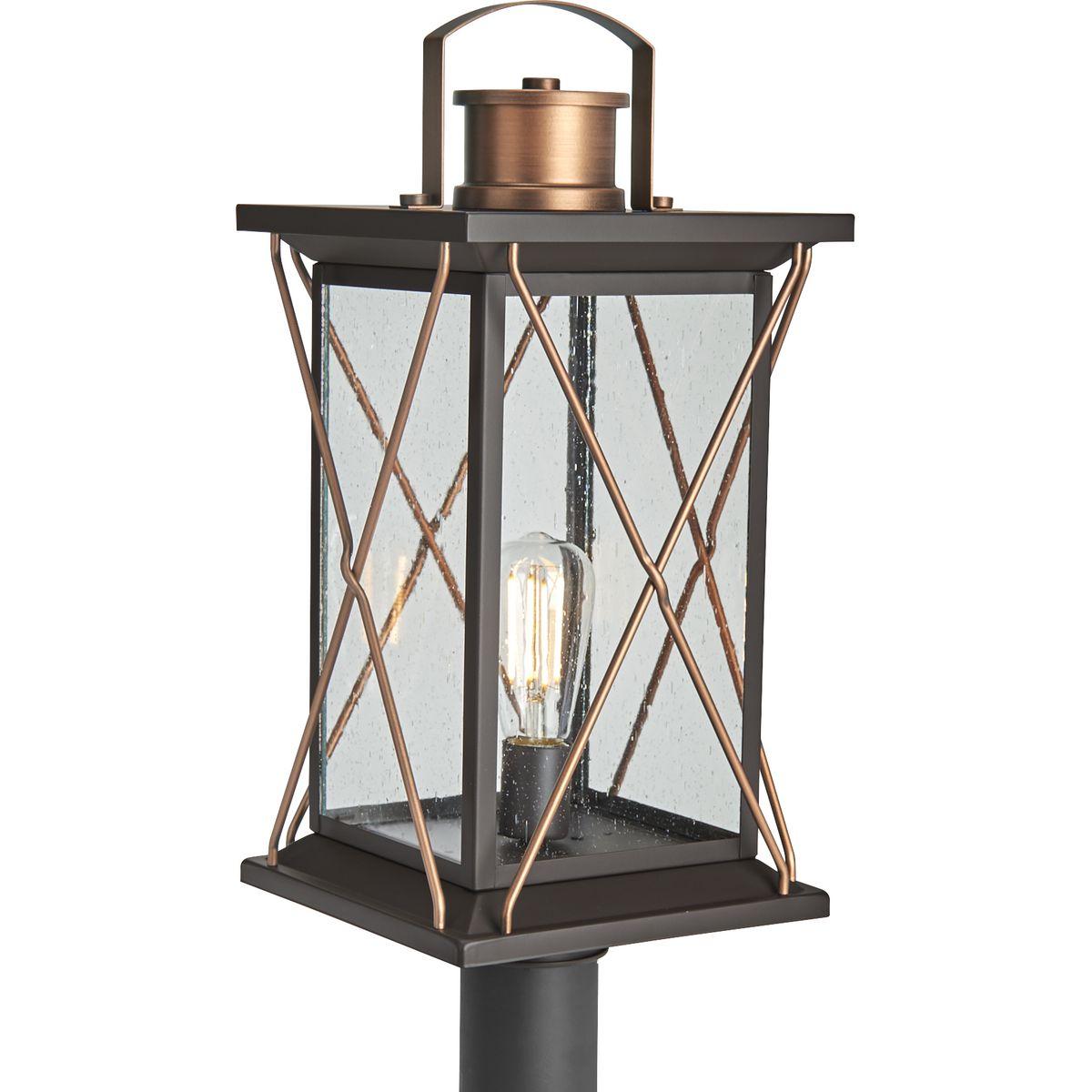 Hubbell P540068-020 Transform your home into a warm and cozy dream with the friendly farmhouse-style of this post lantern. A rustic X-brace design decorates each side of the charming lantern silhouette. Clear seeded glass panes add an extra pop of rustic personality. An anti
