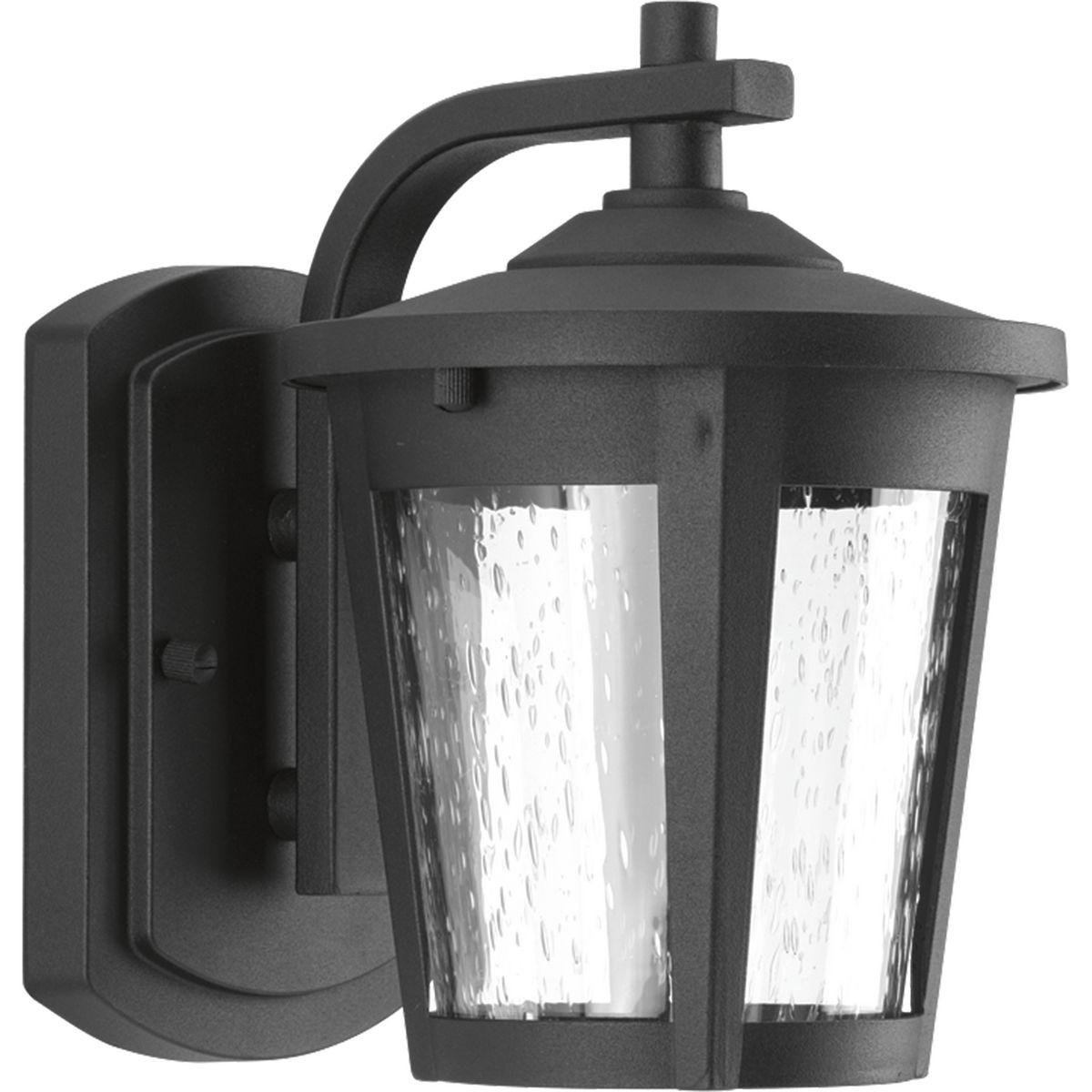 Hubbell P6077-3130K9 Small LED Wall lantern with contemporary styling and clear seeded glass. 120V AC replaceable LED module, 623 lumens (source), 3000K color temperature and 90+ CRI.  ; Contemporary styling. ; Features clear seeded glass. ; Powder coated finish. ; Meets Cali