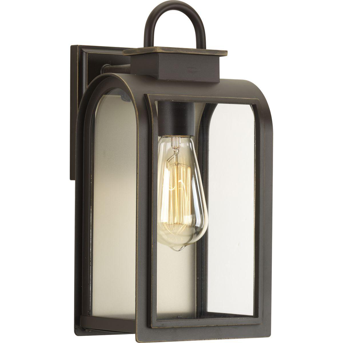 Hubbell P6030-108 One-light small wall lantern in a Cape Cod-inspired frame pays homage to a classic nautical style. Light output and geometric forms offer visual interest to outdoor exteriors. Clear glass windows are paired with a unique umber reflector panel that provide