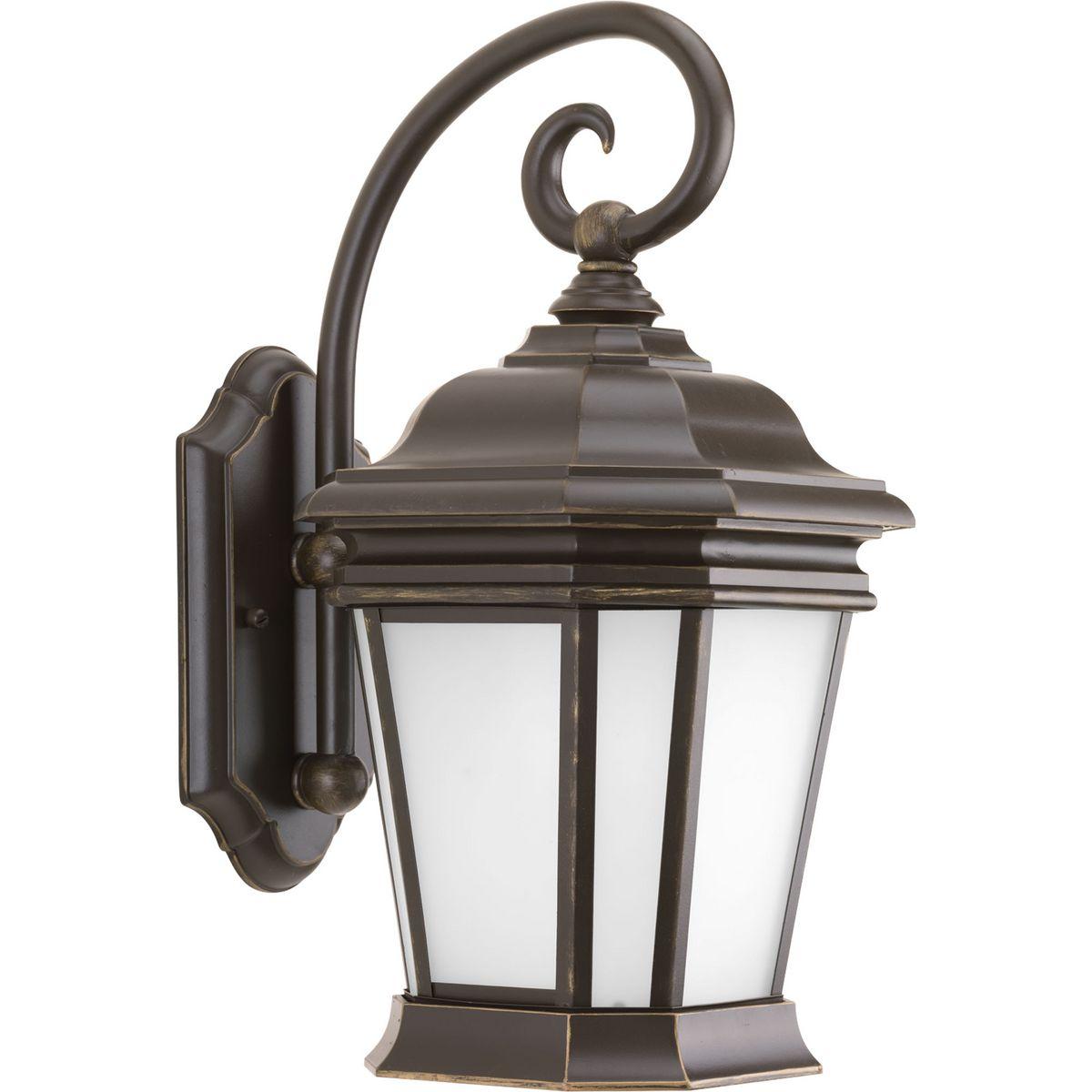 Hubbell P5686-108MD This wall lantern offers updated traditional styling with scroll arm. Etched white glass panes give off a soft glow of light. The panes are housed in a handsome oil-rubbed bronze frame.  ; Etched white glass panes give off a soft glow of light. ; The pane