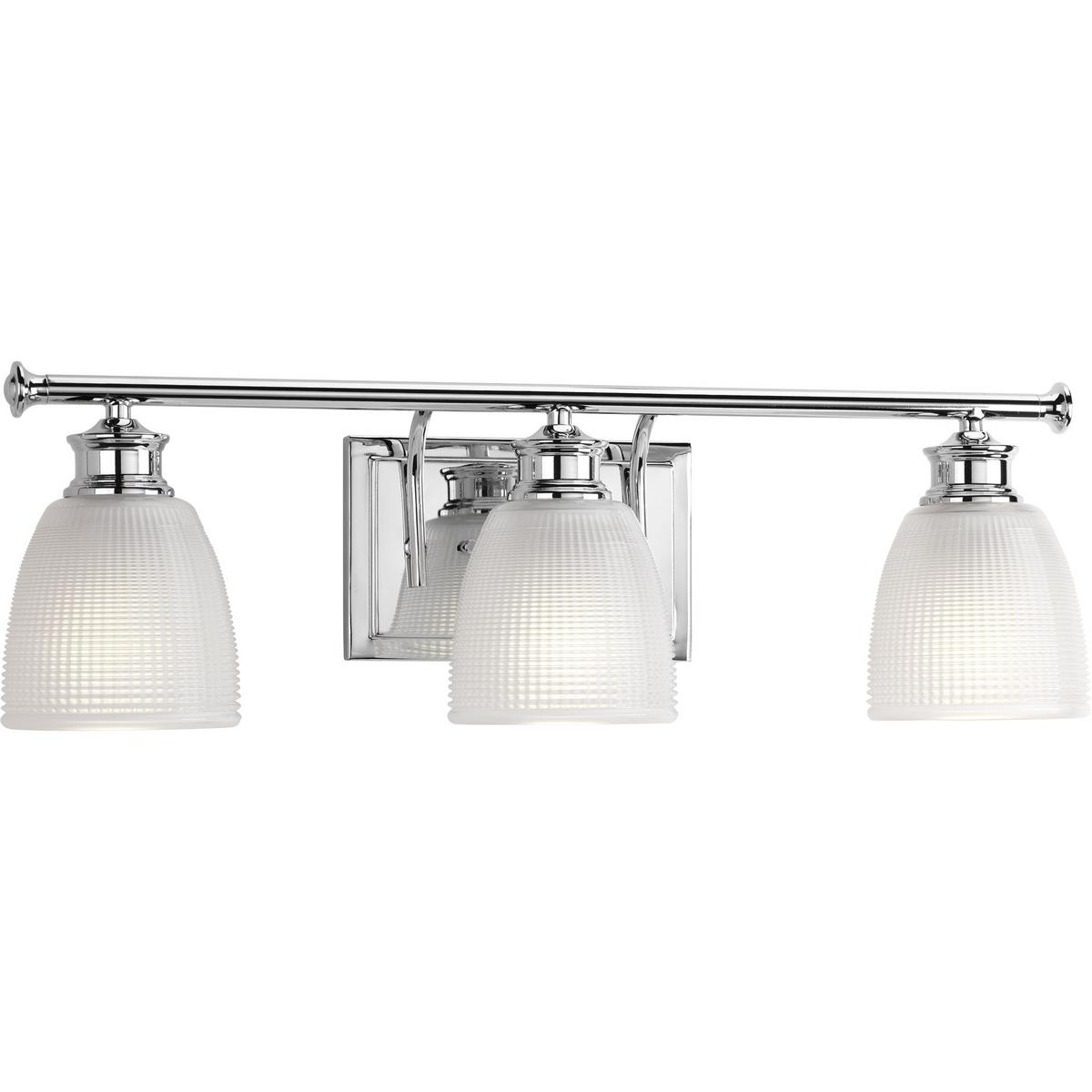 Hubbell P2117-15 Three-light bath from the Lucky Collection, with a distinctive design that evokes a vintage flair with finely crafted details. Light is beautifully illuminated through double prismatic frosted glass shades. Polished Chrome finish.  ; Ideal for a bathroom 