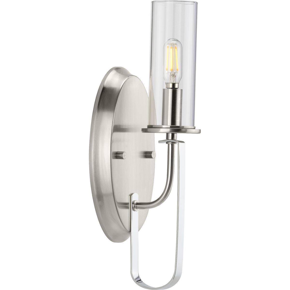 Hubbell P710082-009 Incorporate a sleek simplicity and natural beauty with the Riley Collection's One-Light Brushed Nickel Wall Bracket. A clear glass shade offers stunning illumination. The shade rests on a gorgeous dual-toned frame with a brushed nickel finish and touches 