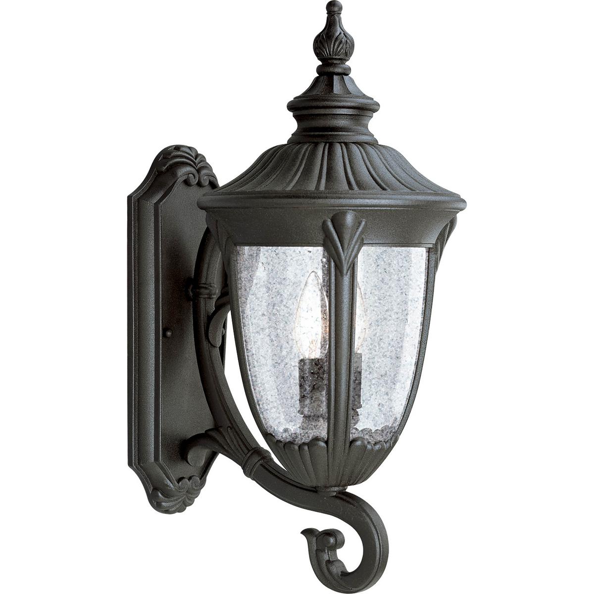 Hubbell P5823-31 The Meridian Collection features decorative shepherd hooks and acanthus cast arms. Clear, seed glass urns finishes off the distinctive and stately feeling of old world elegance. The two-light cast aluminum large wall lantern has a durable Textured Black p