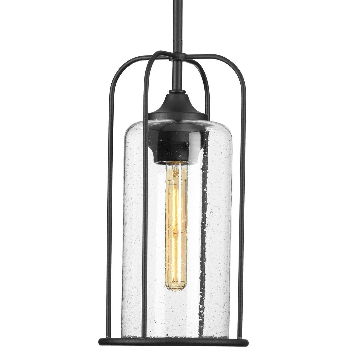 Hubbell P550292-031 Incorporate a timeless style inspired by Victorian-era gaslight fittings with the Watch Hill Collection 1-Light Textured Black Clear Seeded Glass Farmhouse Hanging Pendant Lantern Light. The elongated cage design highlighted by gracefully curving slender 