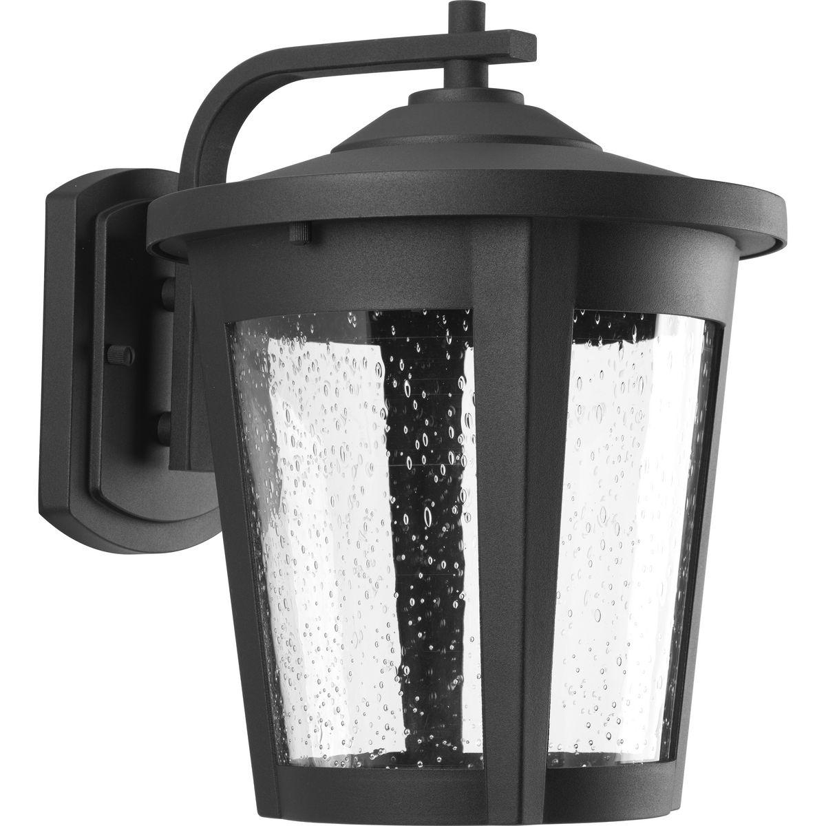 Hubbell P6079-3130K9 The East Haven LED Collection offers modern styling to complement a wide variety of home styles. The one-light large LED outdoor wall lantern has a Black frame that cradles a seeded glass shade. 120V AC replaceable LED module, 1,211 lumens 71.2 lumens/wat