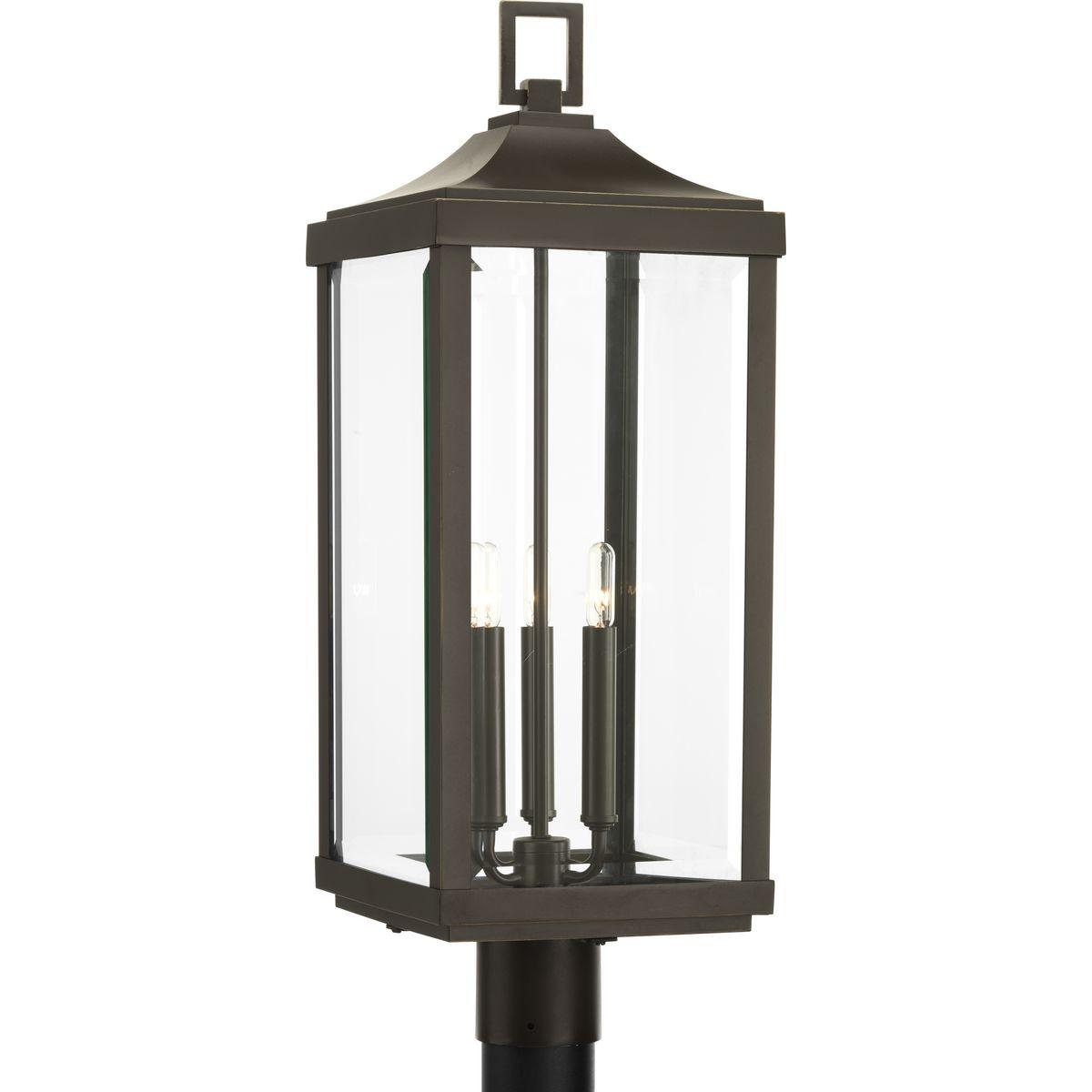 Hubbell P540004-020 Elongated frames capture the romantic charm of vintage gas lanterns. Inspired by a stroll down a Charlestonian street bearing the same name, the Gibbes Street collection's three-light post lantern features clear beveled glass and an Antique Bronze finish.