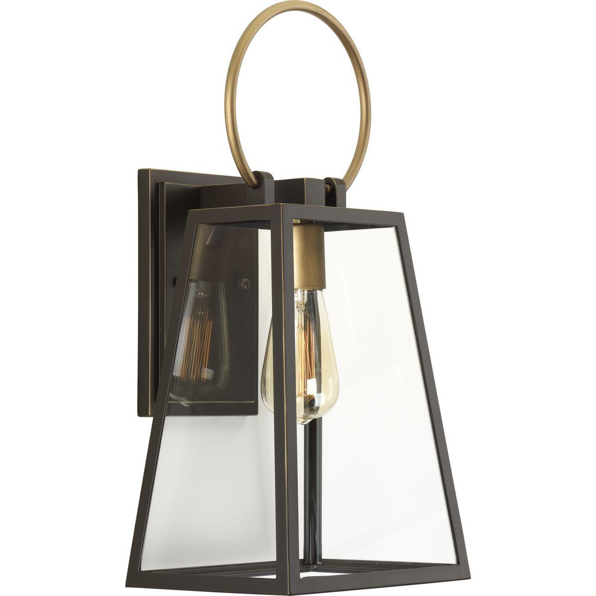 Hubbell P560078-020 Barnett lanterns deliver timeless appeal with a decidedly modern flair. Large clear panes of glass frame your choice of traditional or vintage style bulbs. A graphic-inspired overscaled loop features a contrasting brass-tone finish. One-Light Medium Wall 