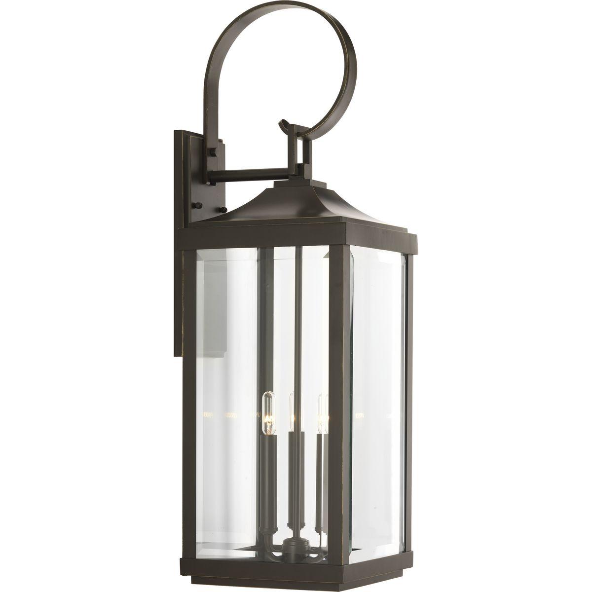 Hubbell P560023-020 Elongated frames capture the romantic charm of vintage gas lanterns. Inspired by a stroll down a Charlestonian street bearing the same name, the three-light wall lantern in the Gibbes Street outdoor lantern collection features clear beveled glass and an A