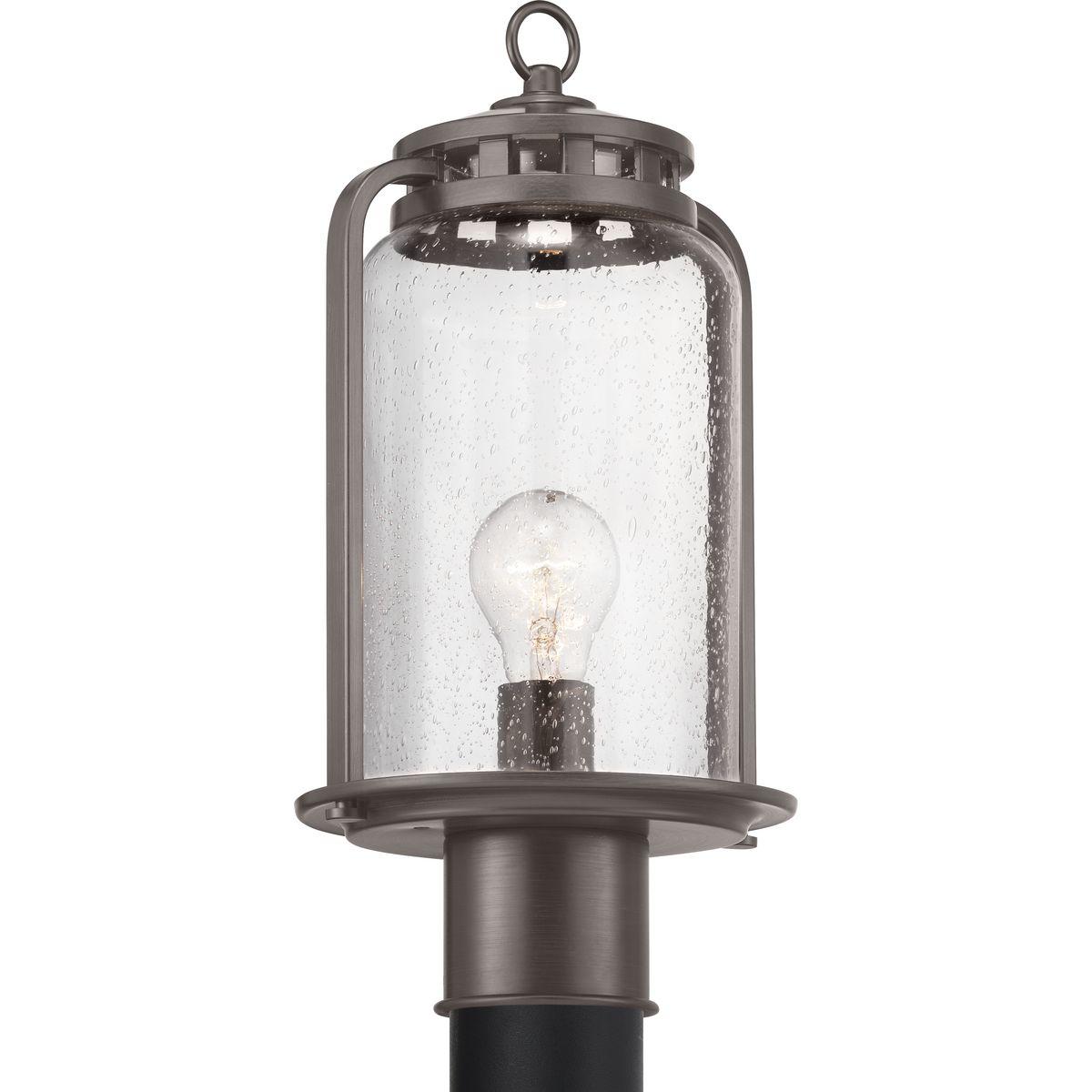 Hubbell P6436-20 Provide a casual, rustic feel with a vintage flair to your home's interior or exterior spaces with this post lantern. Finely crafted metal accents create a light-house inspired design with an antique bronze frame. The frame holds a clear seeded glass shad