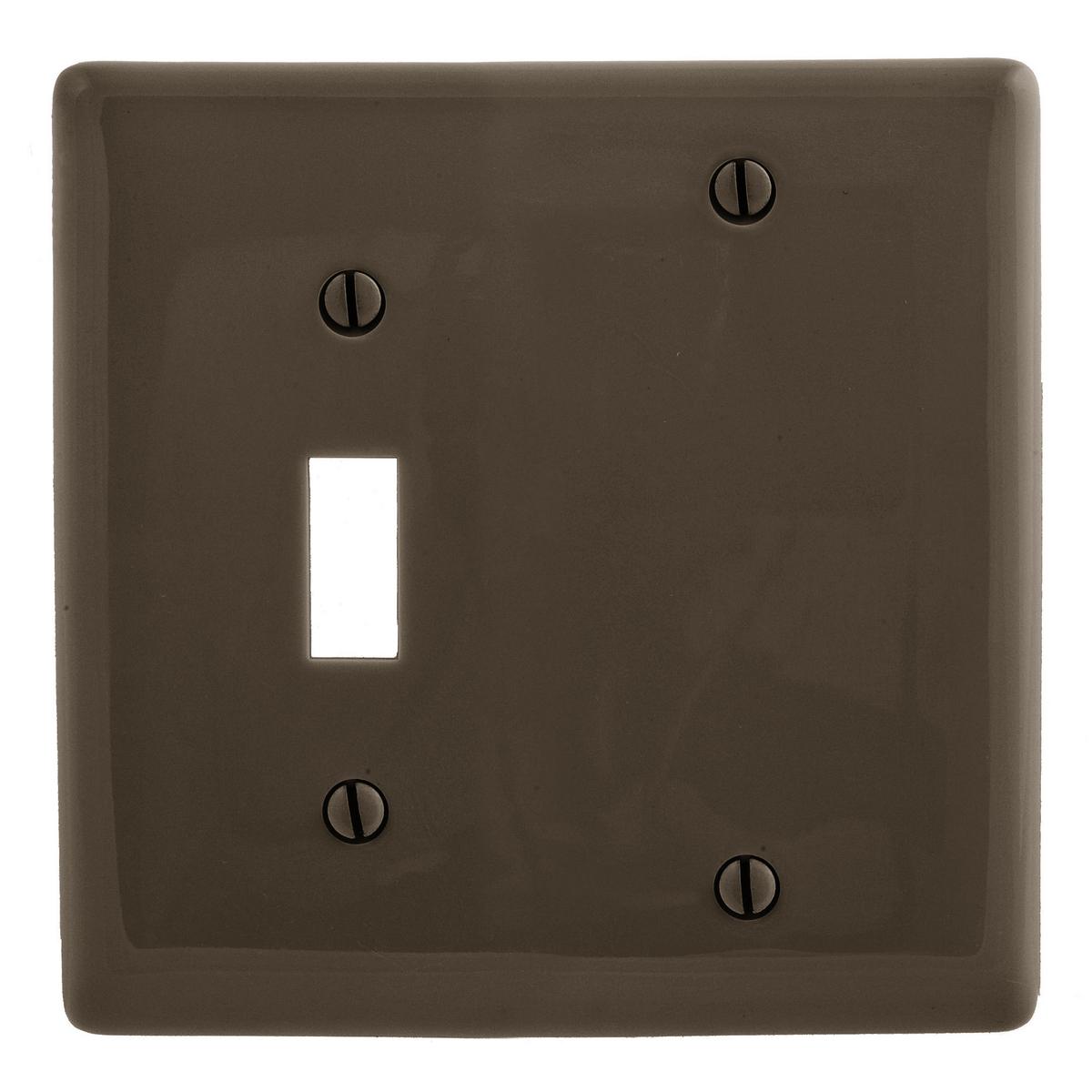 Hubbell NP113 Wallplates and Box Covers, Wallplate, Nylon, 2-Gang, 1) Toggle 1) Blank, Brown  ; Reinforcement ribs for extra strength ; High-impact, self-extinguishing nylon material ; Captive screw feature holds mounting screw in place ; Standard Size is 1/8" larger t