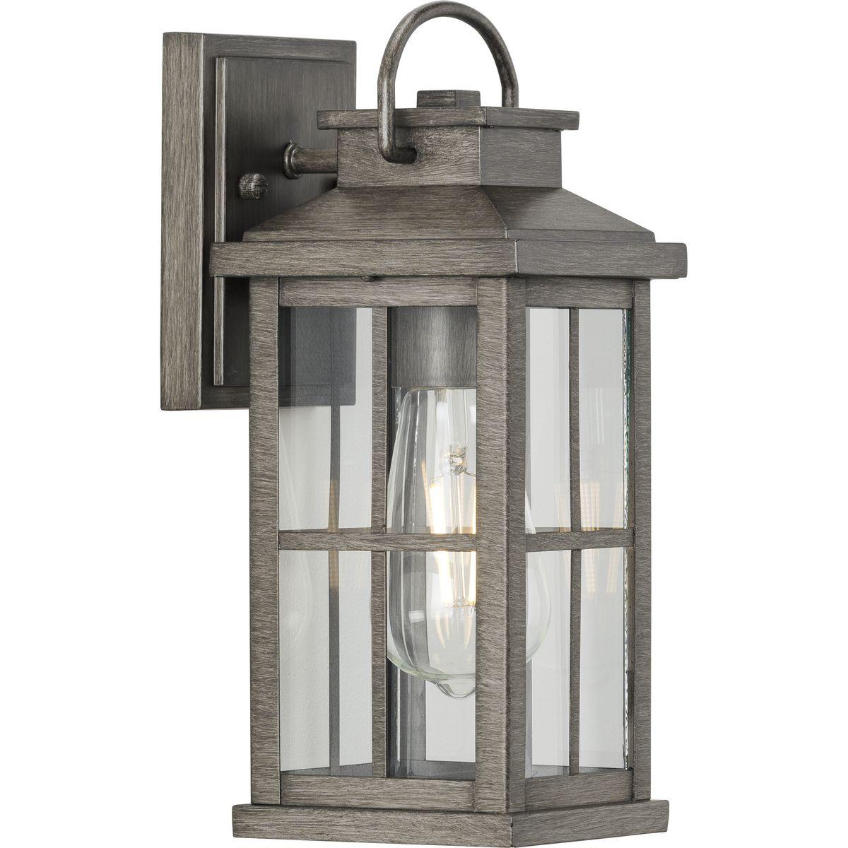 Hubbell P560264-103 Cultivate a timeless aesthetic with the Williamston Collection 1-Light Clear Glass Antique Pewter Farmhouse Outdoor Small Wall Lantern Light. A light source glows from within clear glass panes beneath a traditional windowpane design for classic character.