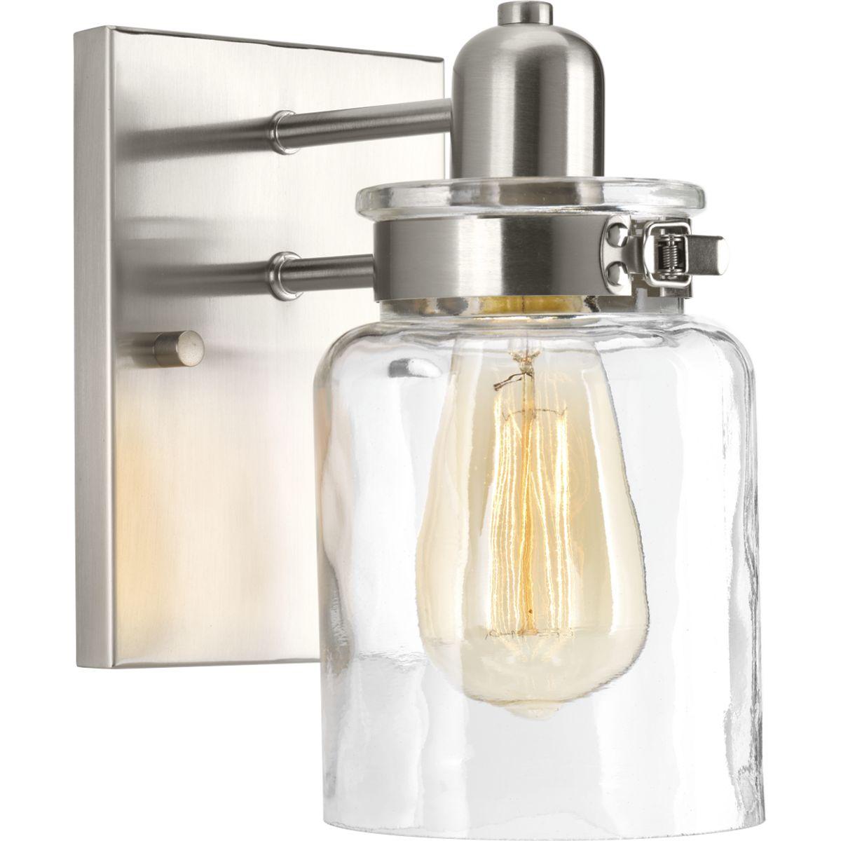Hubbell P300045-009 A delightful trend in home decor is the repurposing of antique parts into new, functional furniture and accessories. The Calhoun Collection playfully follows this lead with an apothecary style and features a clear glass diffuser held in place with a mecha