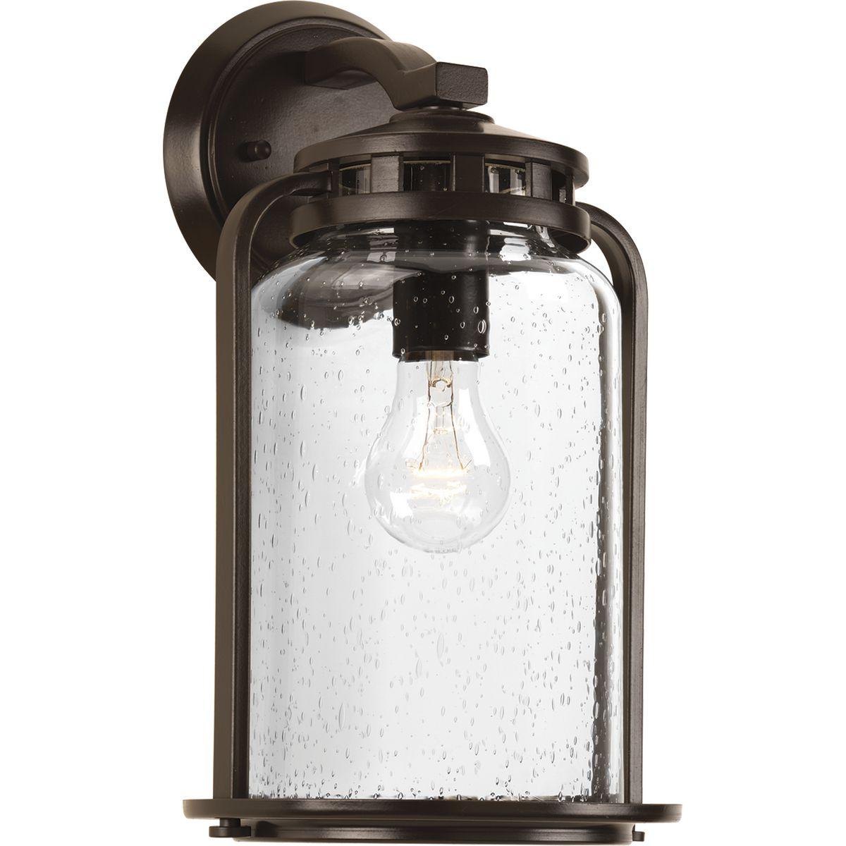 Hubbell P6050-20 The one-light medium wall lantern from the Botta Collection provides a casual feel to complement interiors and exteriors with vintage flair. Finely crafted accents highlight clear seeded glass.  ; Casual feel with vintage flair. ; Complements both interio
