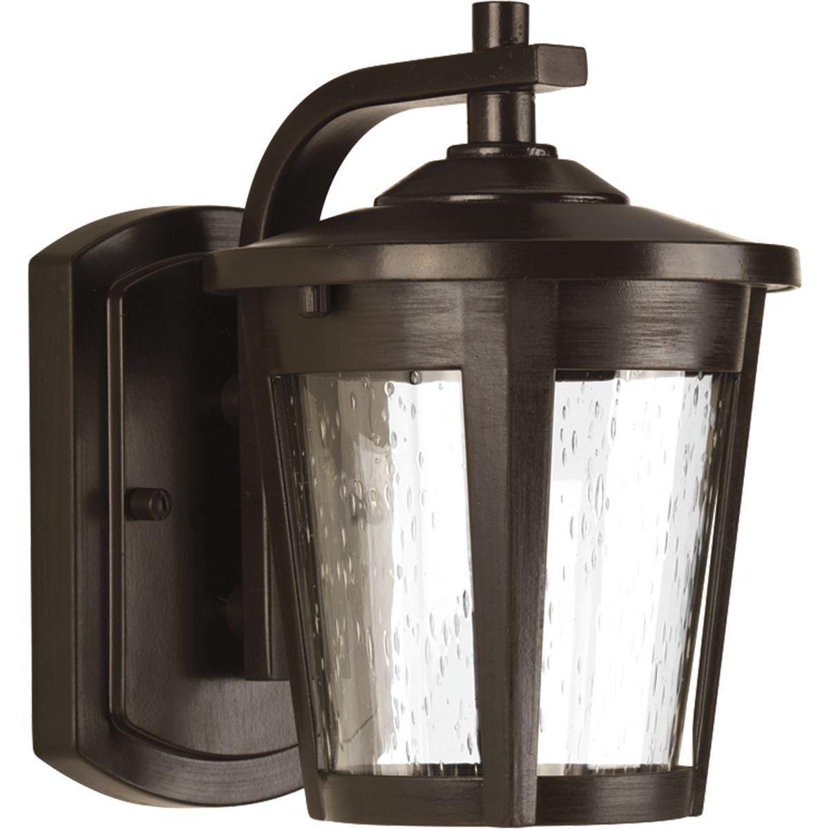 Hubbell P6077-2030K9 Small LED Wall lantern with contemporary styling and clear seeded glass. 120V AC replaceable LED module, 623 lumens (source) 3000K color temperature and 90+ CRI.  ; Contemporary styling. ; Features clear seeded glass. ; Powder coated finish. ; Meets Calif